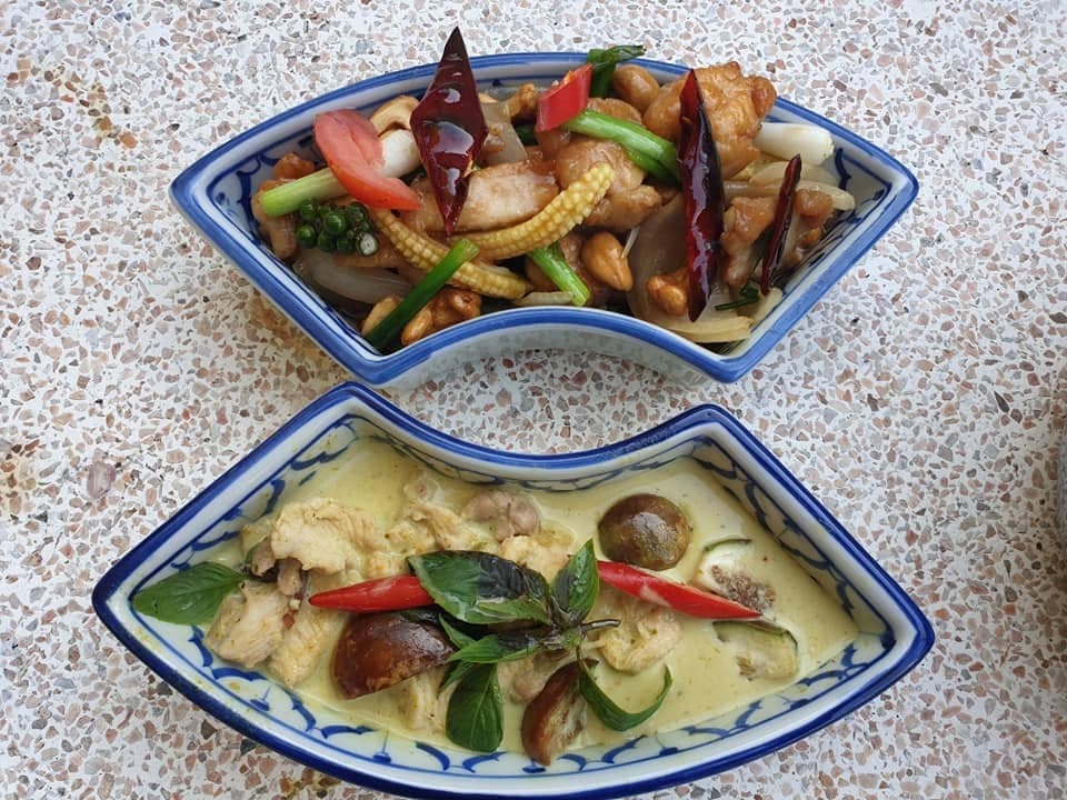 Chicken with cashews, and green curry with Thai basil.